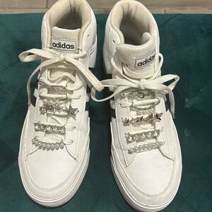 Adidas Skater Sneaker Women’s Size 8 with lace charms.